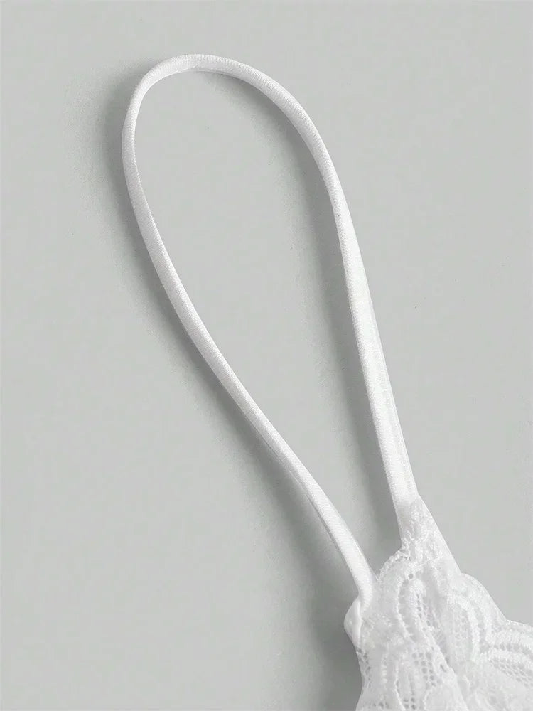 White lace bra on a light gray background